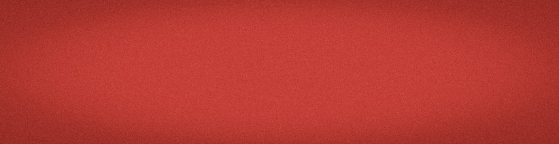 Four business people standing together and smiling